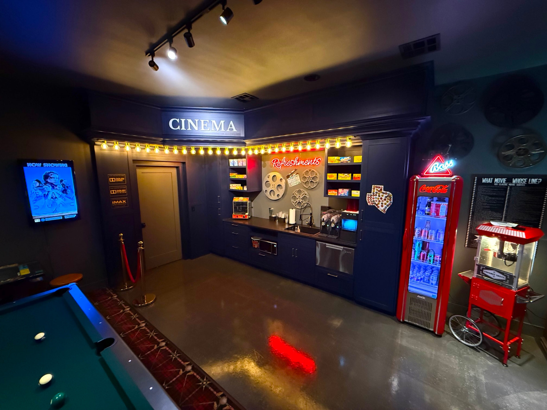 Lobby with refreshments, pool table and popcorn cart