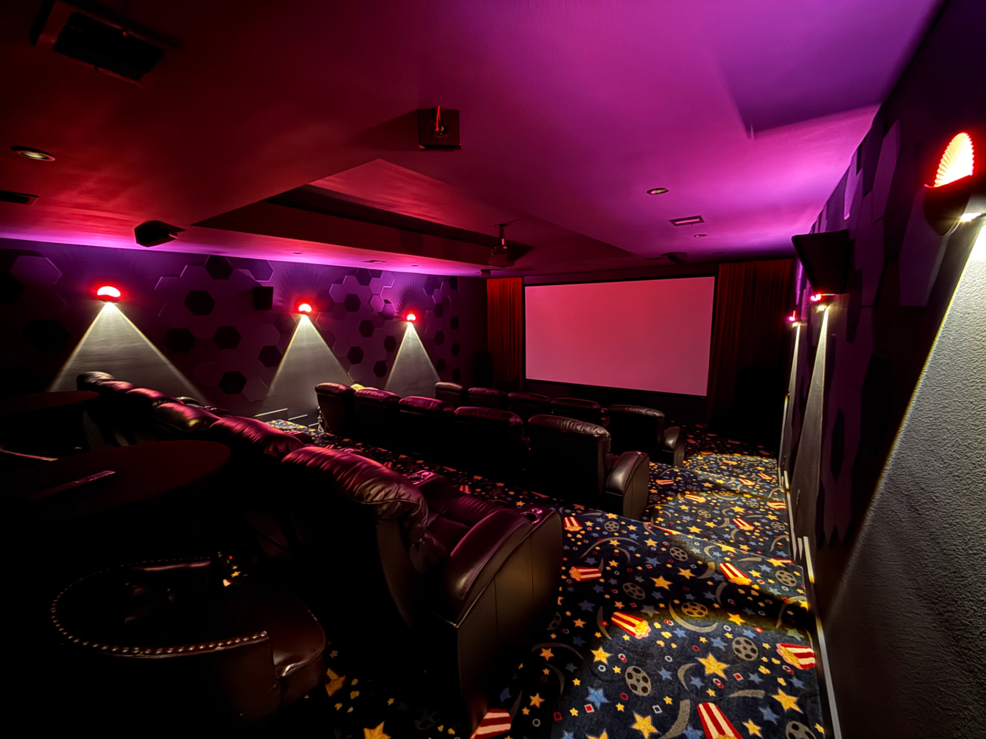 The Cinema theater with screen and recliners
